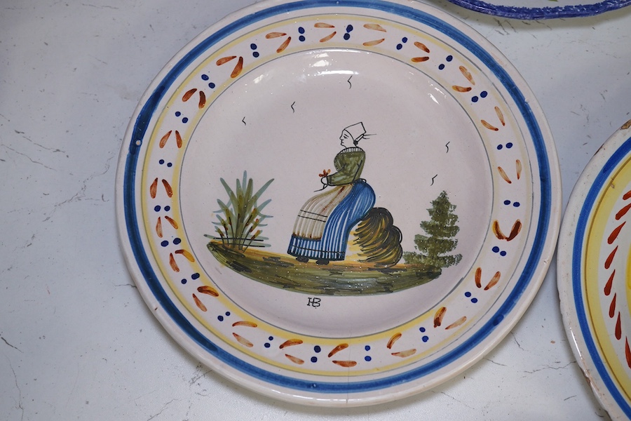 Eleven faience plates by Quimper, Luneville etc. Condition - fair to good